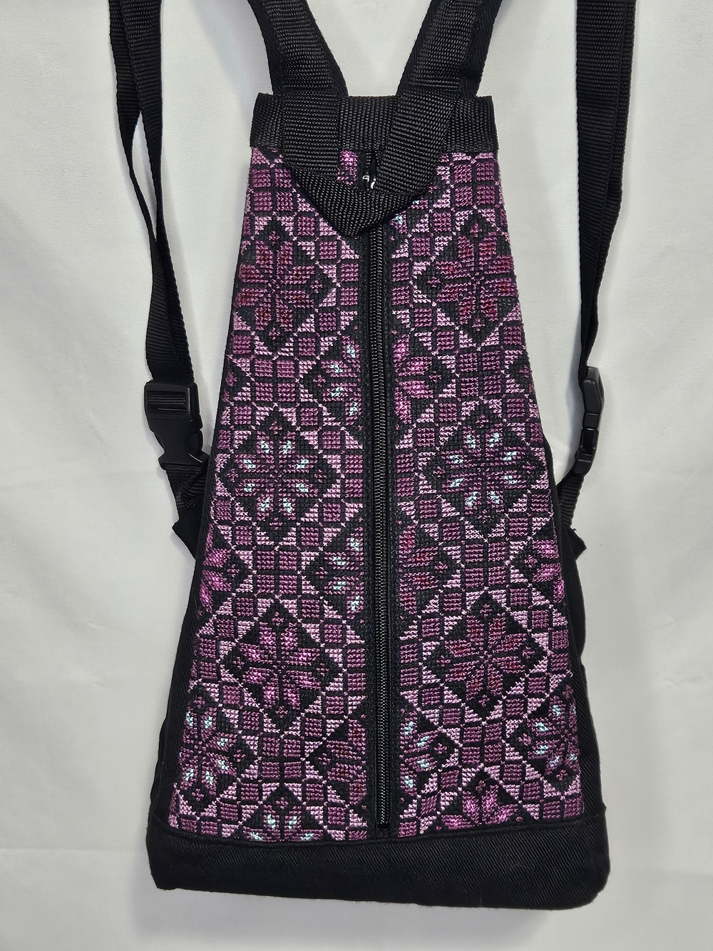 Palestinian Tatreez by IDNA hand embroidered triangle shaped backpack 14x9x7"